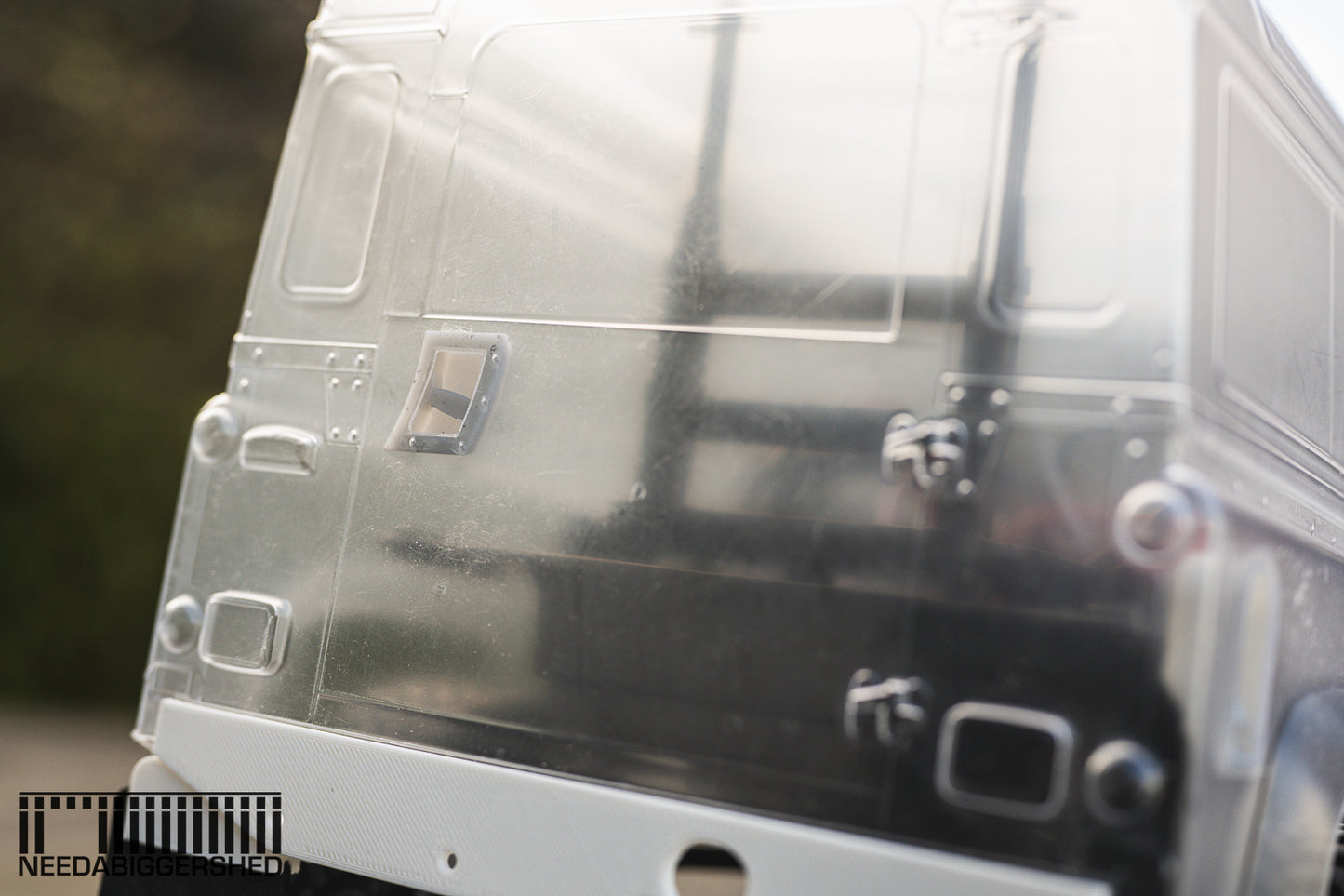 Defender door handles and fuel cap.