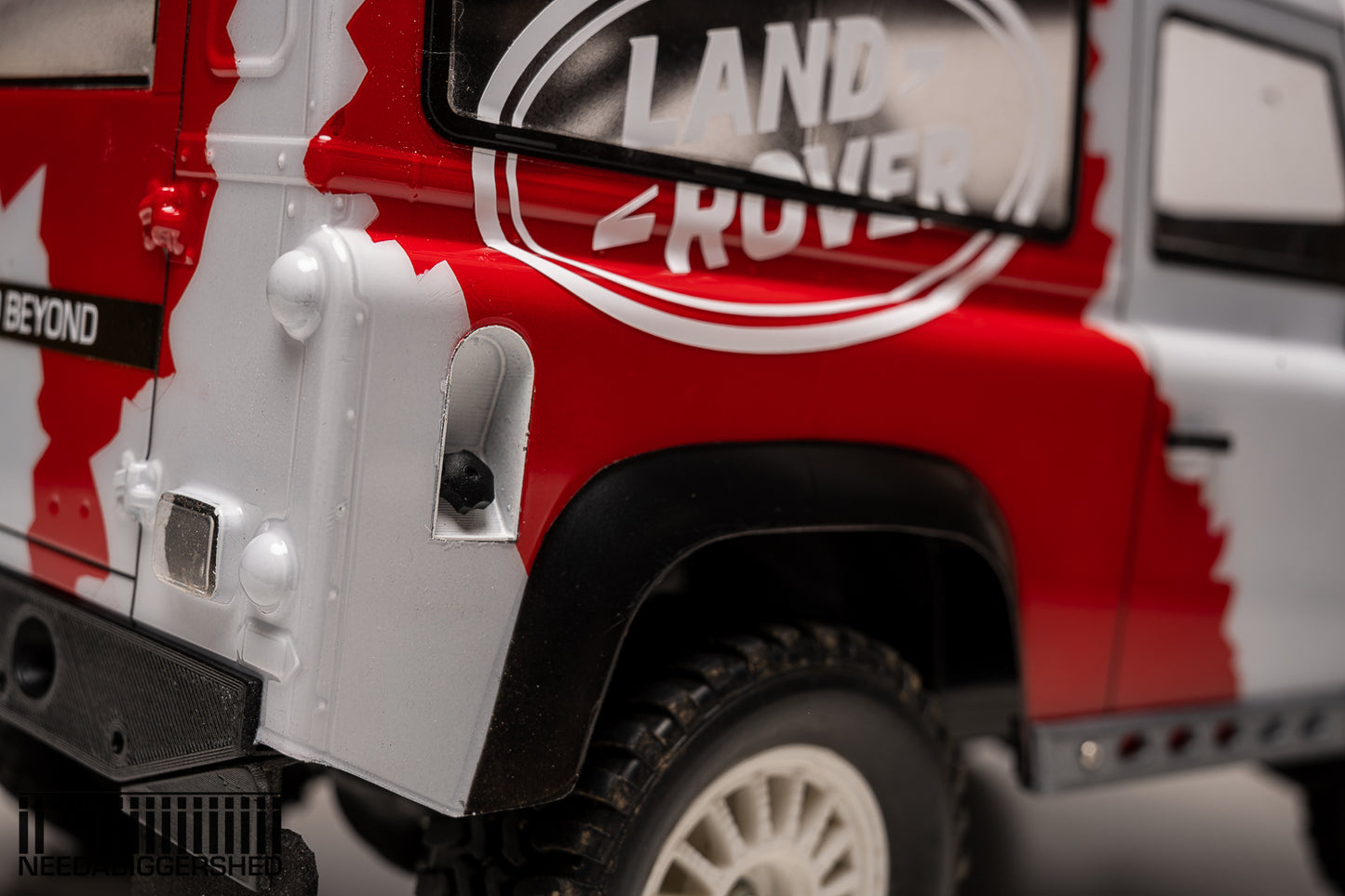Defender door handles and fuel cap.