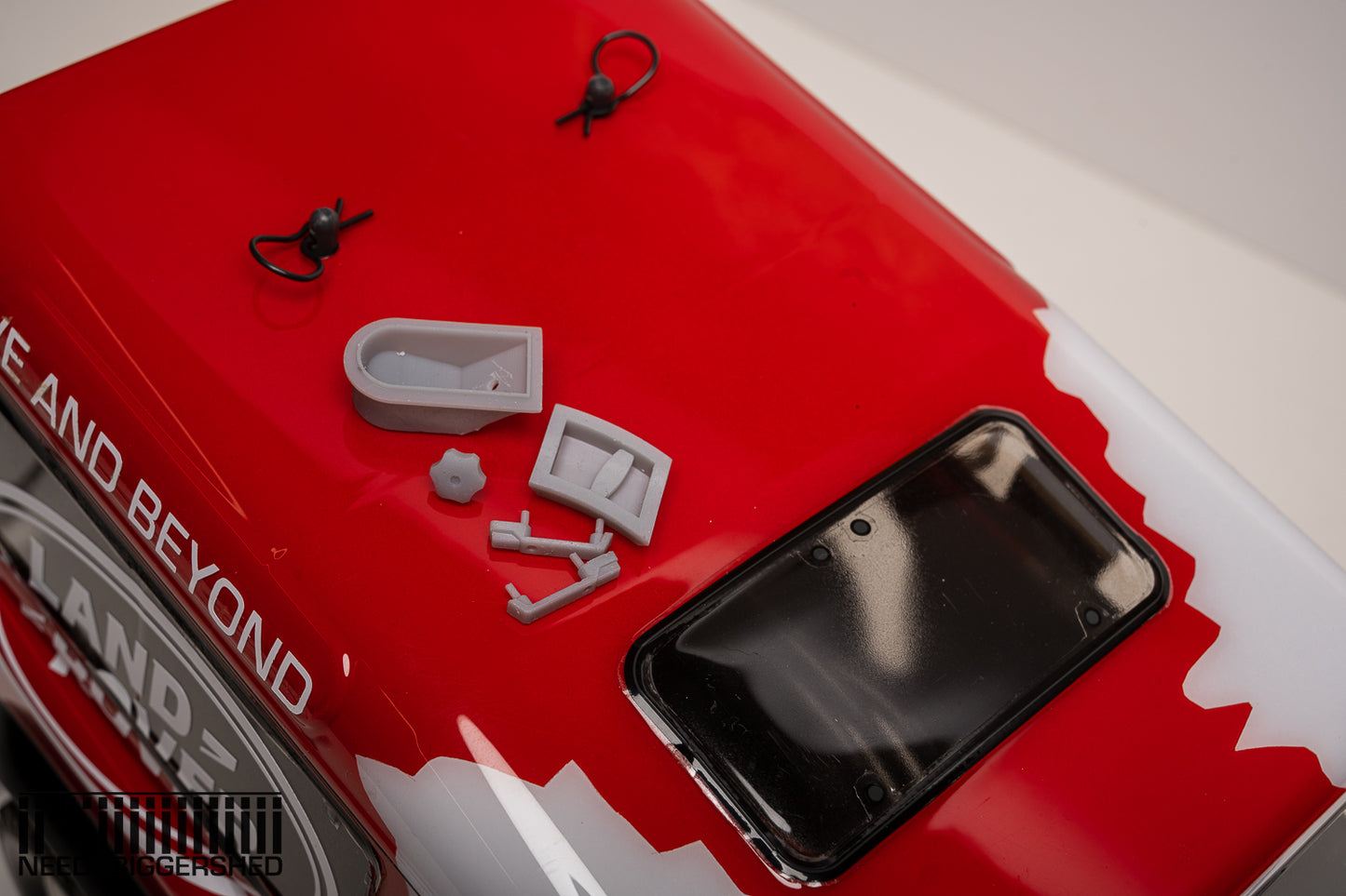 Defender door handles and fuel cap.