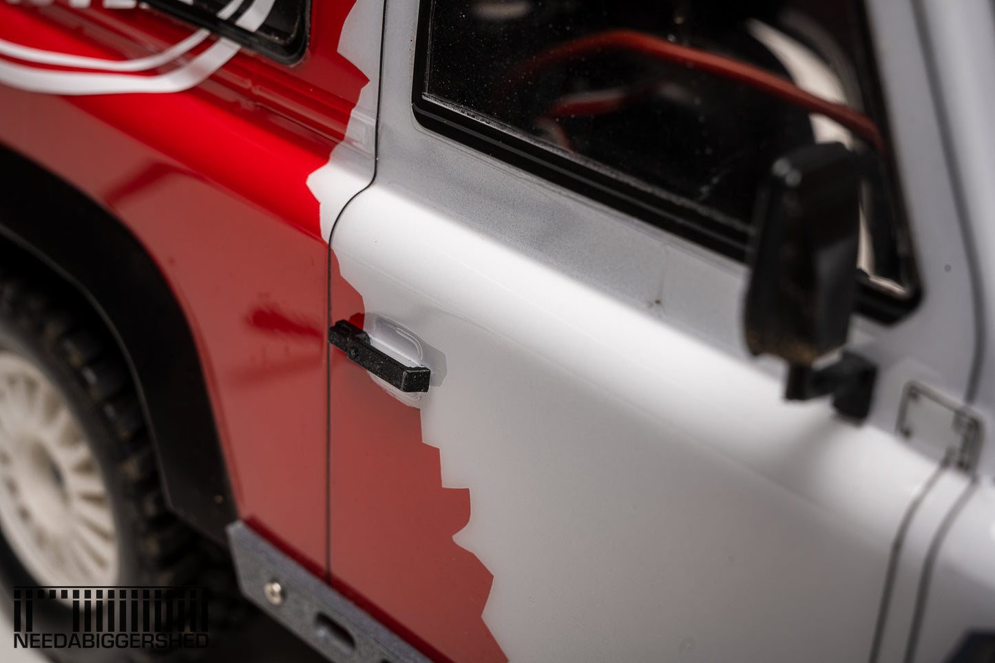 Defender door handles and fuel cap.