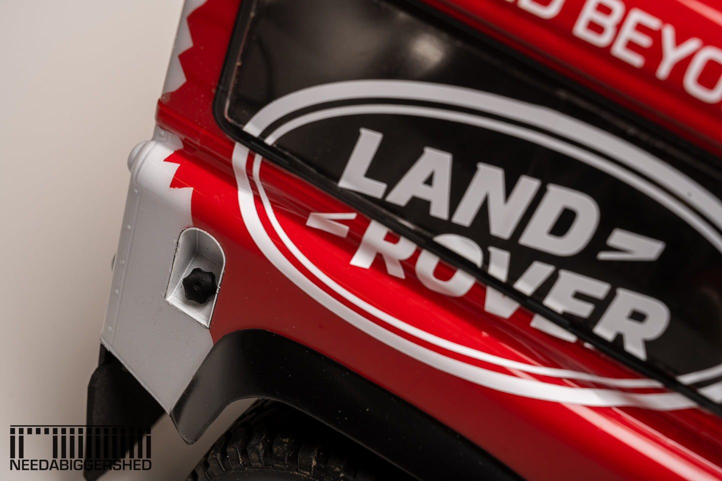 Defender door handles and fuel cap.